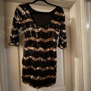 Black and gold sequin cocktail dress